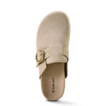 Beige slip-on shoe with a gold buckle on a white background