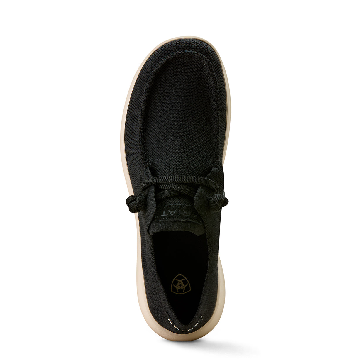 Black shoe with beige sole on a white background