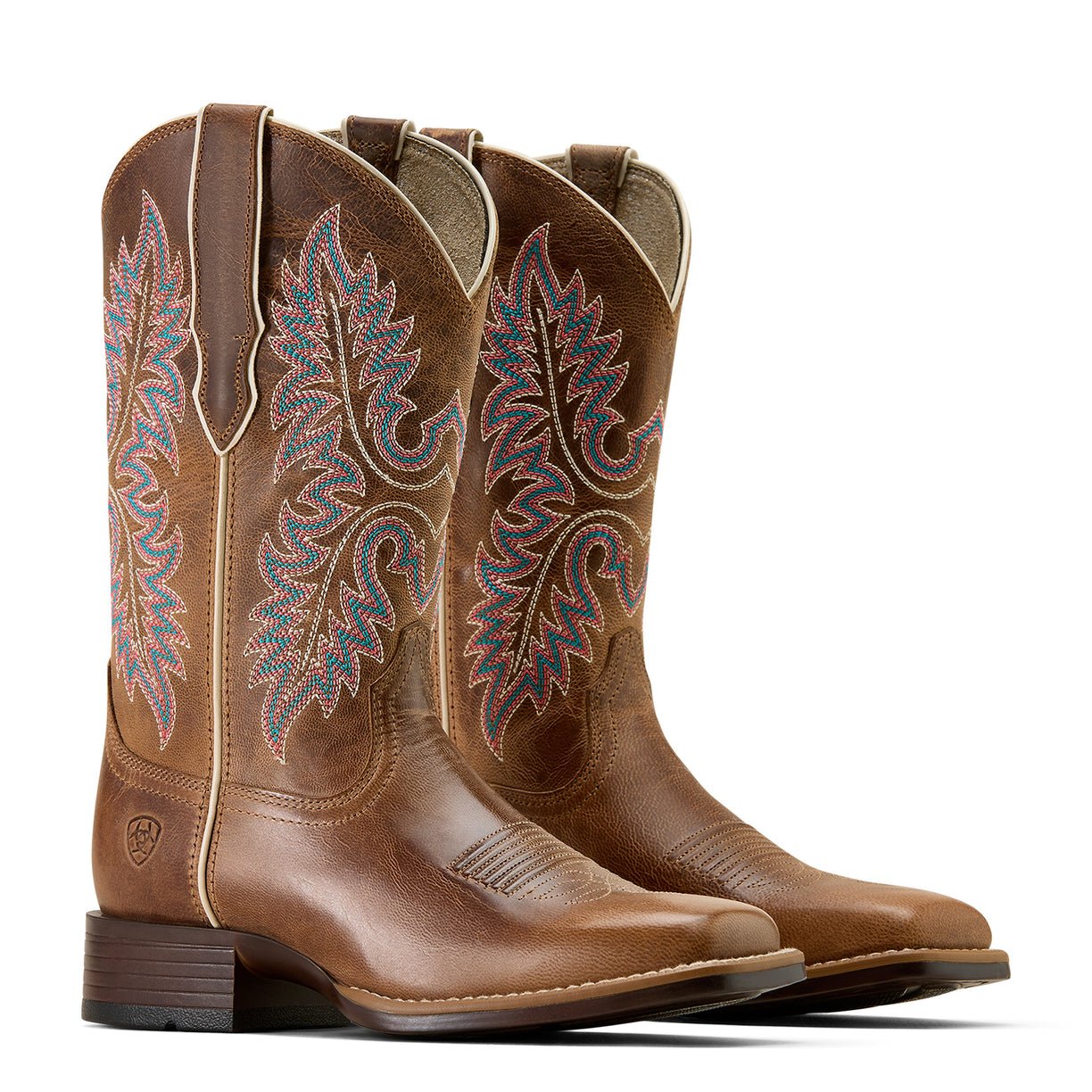 Pair of brown cowboy boots with intricate embroidery on a white background
