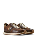 Brown sneakers with white laces on a white background