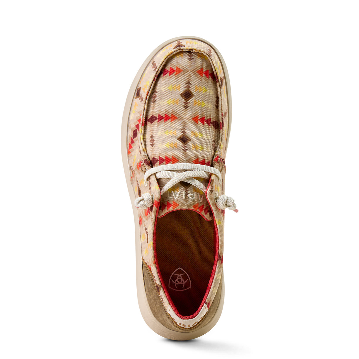 Beige shoe with patterned design on a white background