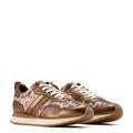 Pair of brown and beige patterned sneakers on a white background