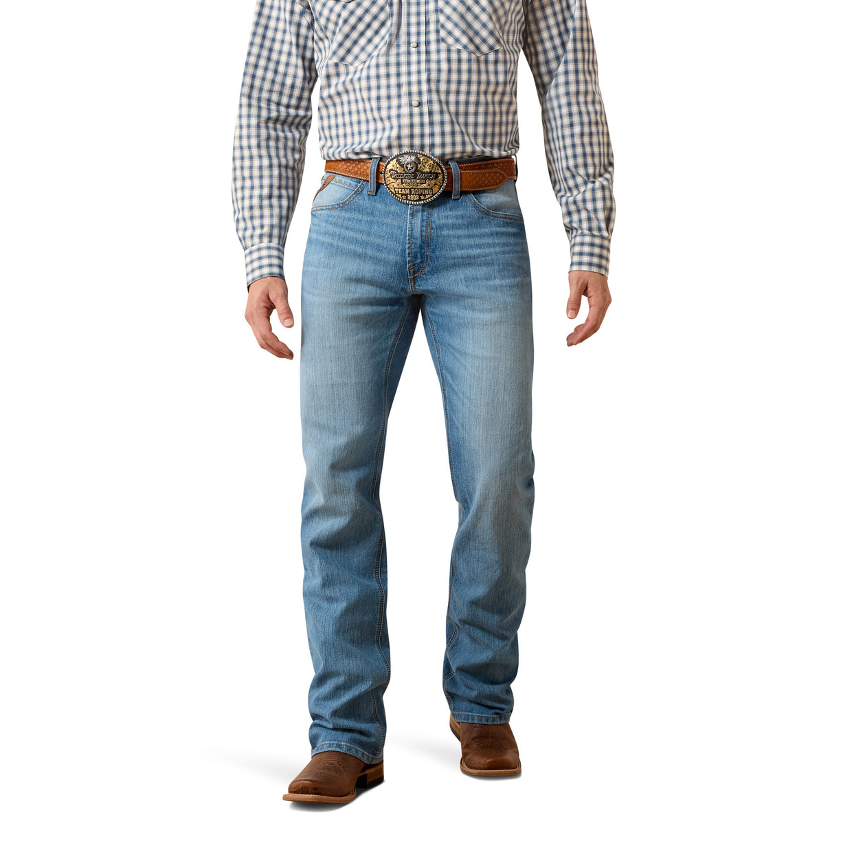 Cowboy wearing blue Ariat boot cut jeans with a checkered shirt and brown belt on a white background