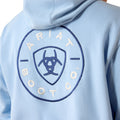 Light blue hoodie with Ariat Boot Co logo on a person wearing it