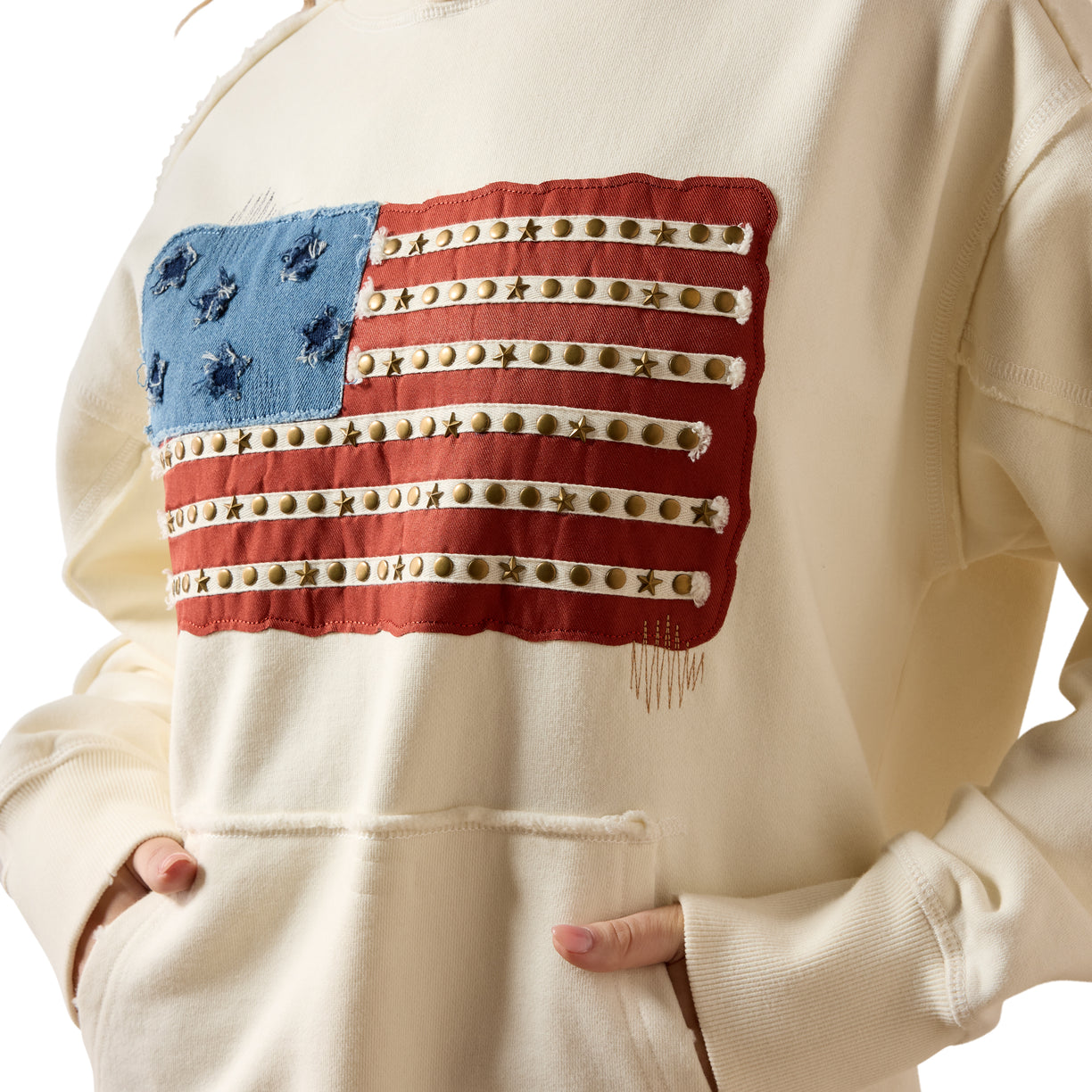 Beige hoodie with American flag patch on a white background