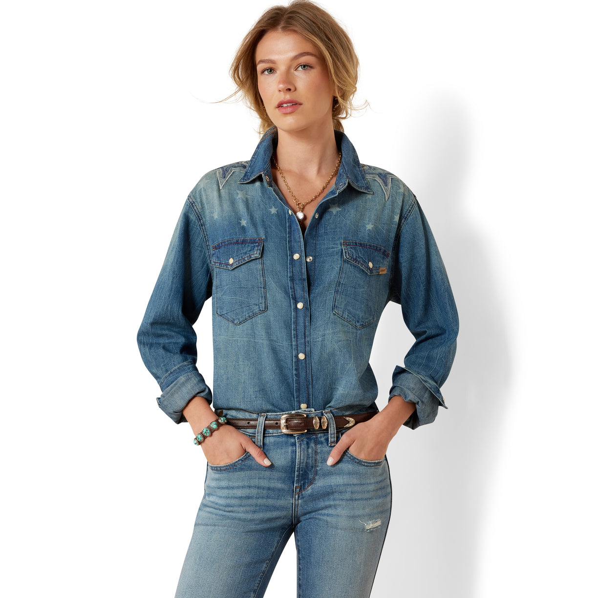 Woman wearing a denim shirt and jeans on a white background