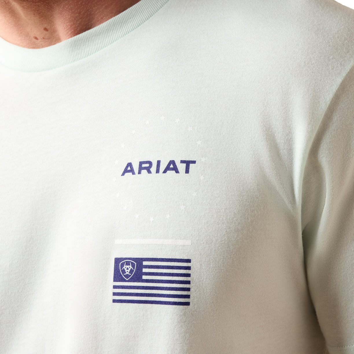 White t-shirt with Ariat logo on a white background