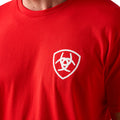Red t-shirt with a white biohazard symbol on a person wearing it.