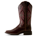 A dark brown leather cowboy boot with intricate western embroidery in red, pink, and white on the shaft, shown in a side profile against a white background.