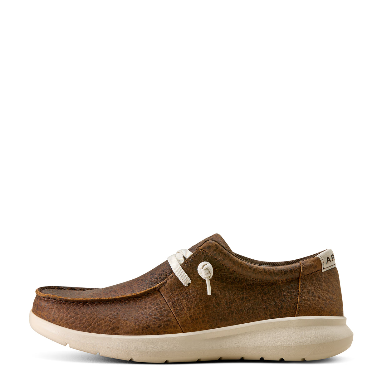 Brown shoe with white sole on a white background