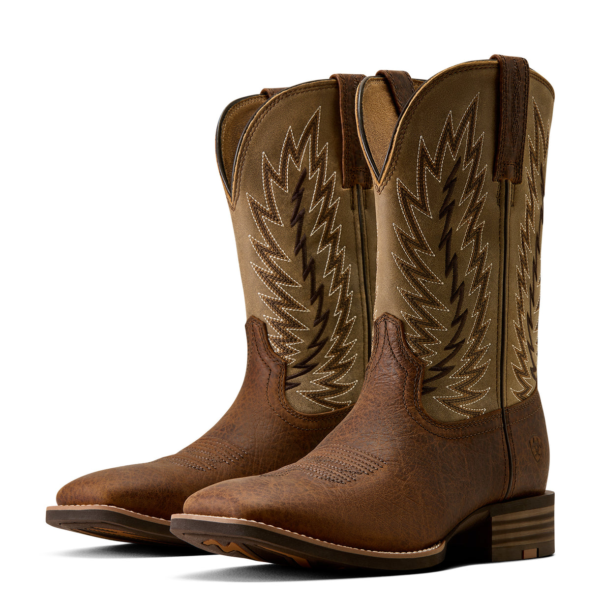 A pair of western cowboy boots in brown leather with tan shafts and dark brown zigzag embroidery, shown on a white background.