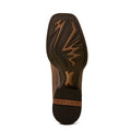 The outsole of an Ariat boot, showing a dark brown rubber tread with tan and brown geometric patterns and a matching brown heel tab embossed with the brand name 'ARIAT'.