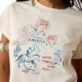 White t-shirt with patriotic design featuring horses, fireworks, and text on a person wearing it.