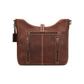 Brown leather handbag with gold accents on a white background
