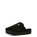 Black slipper with a fuzzy texture on a white background