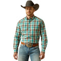 Man wearing a plaid shirt, jeans, and a cowboy hat on a white background