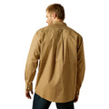Man wearing a brown patterned shirt on a white background