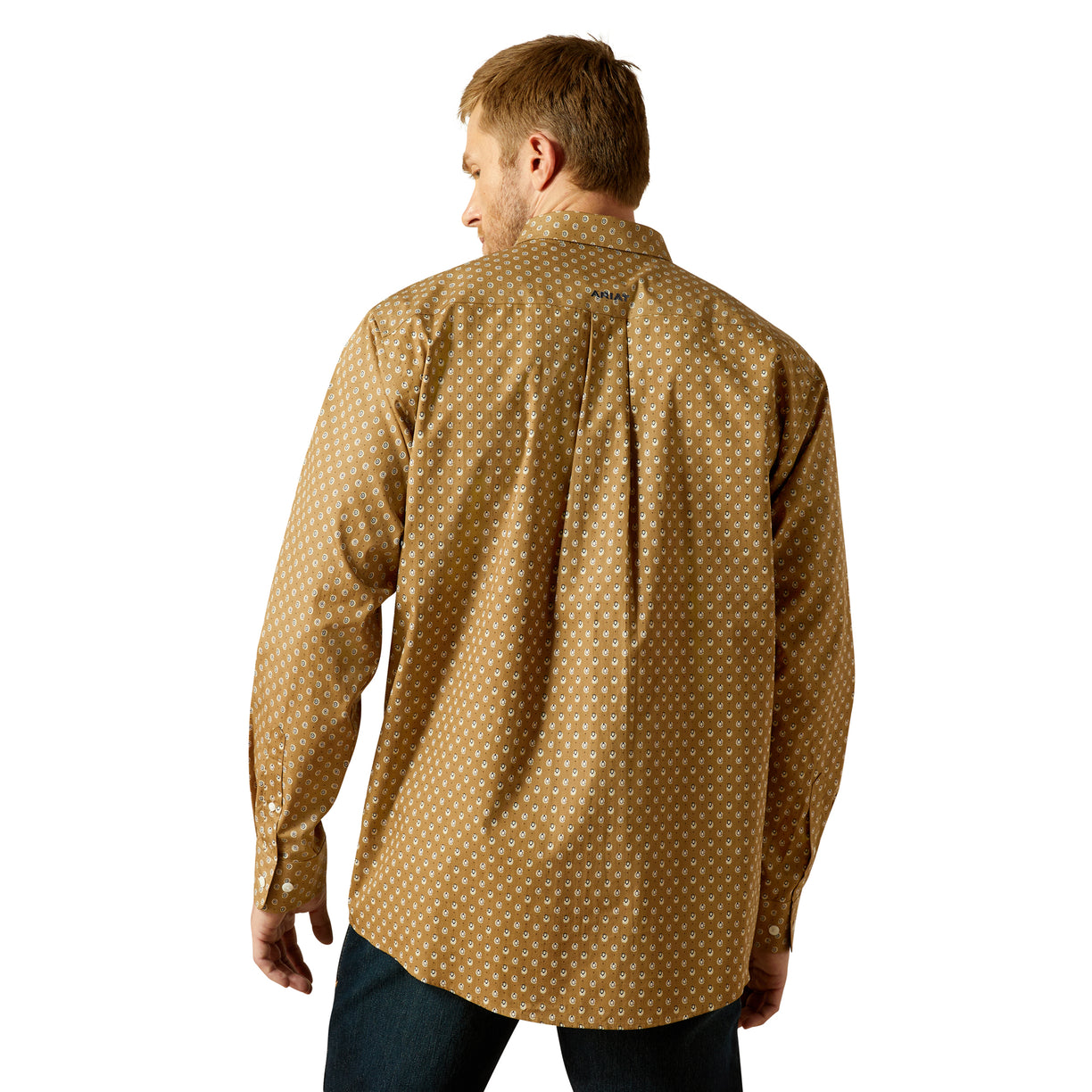Man wearing a brown patterned shirt on a white background