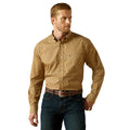 Man wearing a patterned brown shirt and jeans on a white background