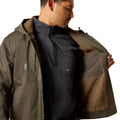 Man wearing a green jacket with brown lining on a white background