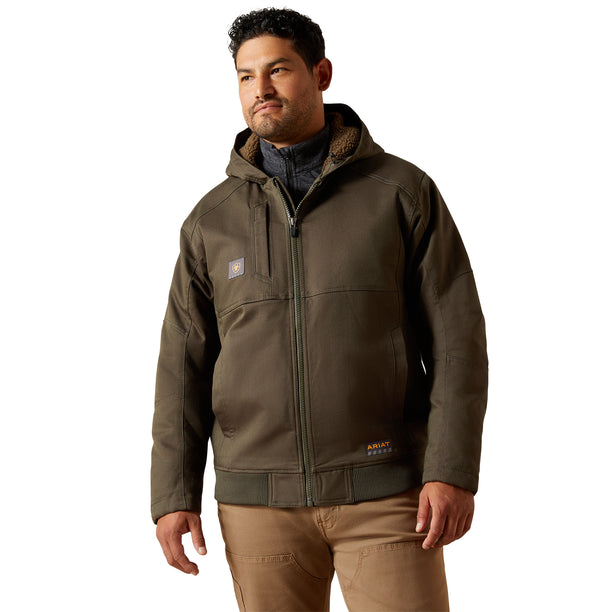 Man wearing a brown jacket with a visible brand logo on a white background