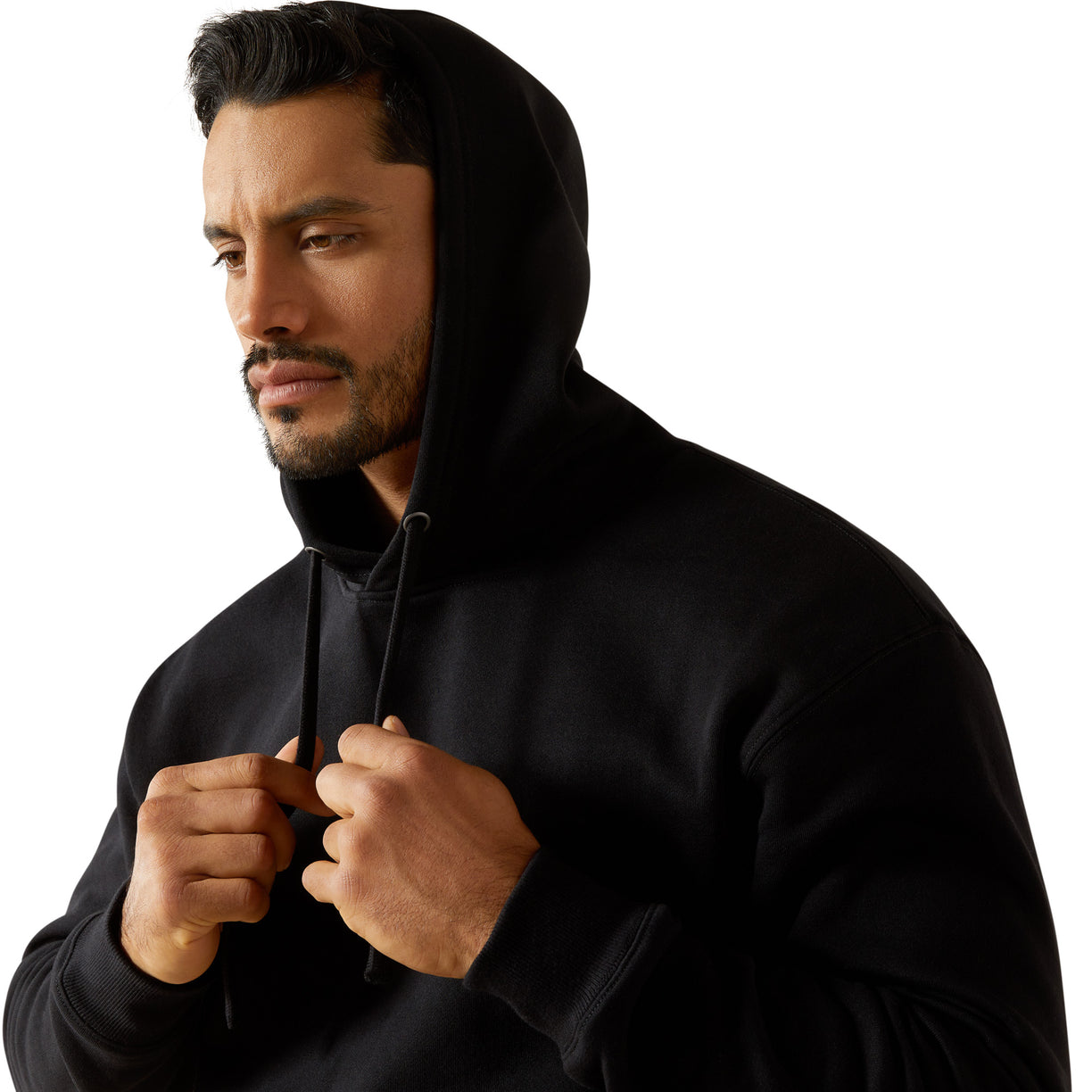 Man wearing a black hoodie against a white background