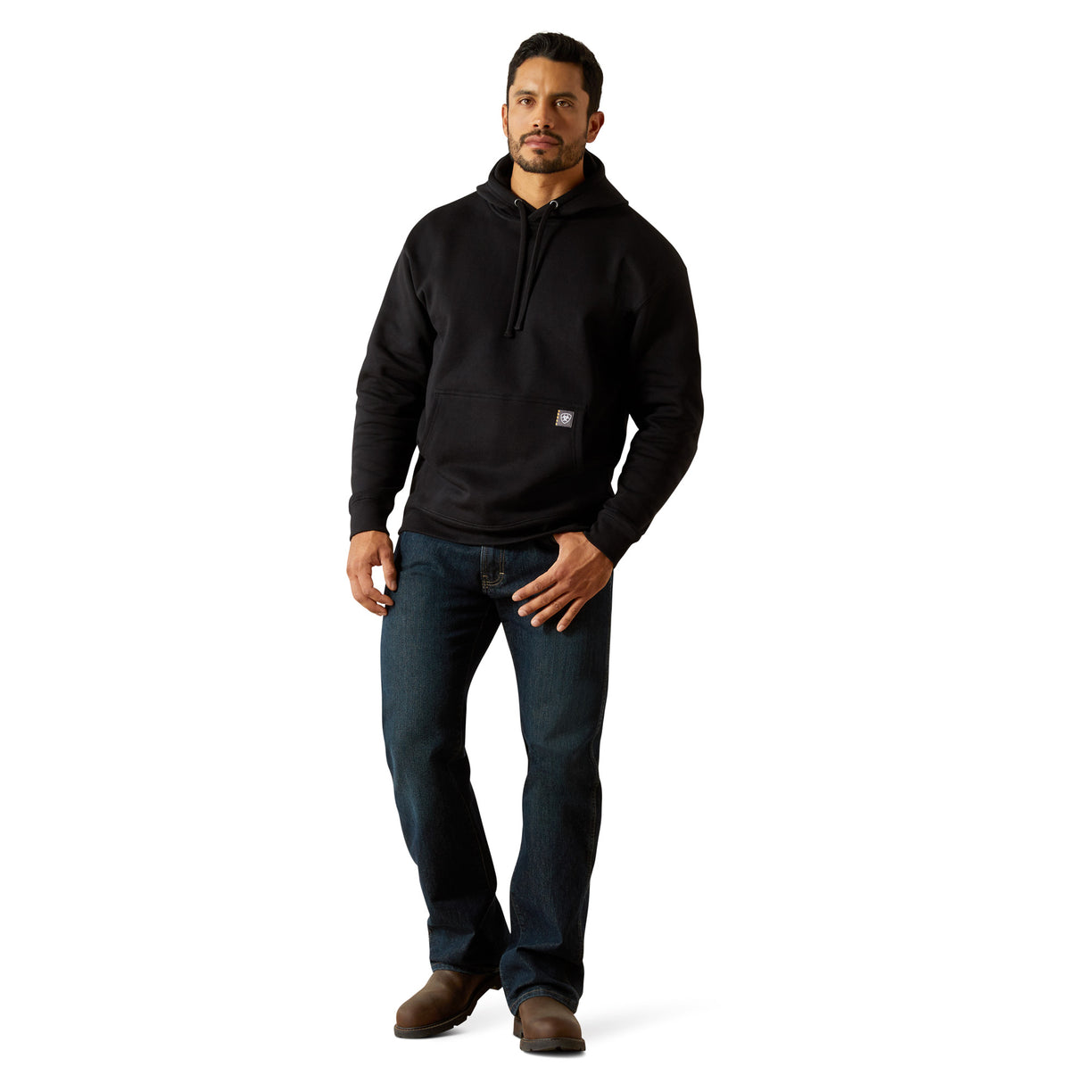 Man wearing a black hoodie and jeans on a white background