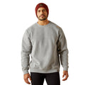 Man wearing a gray sweatshirt and red beanie on a white background