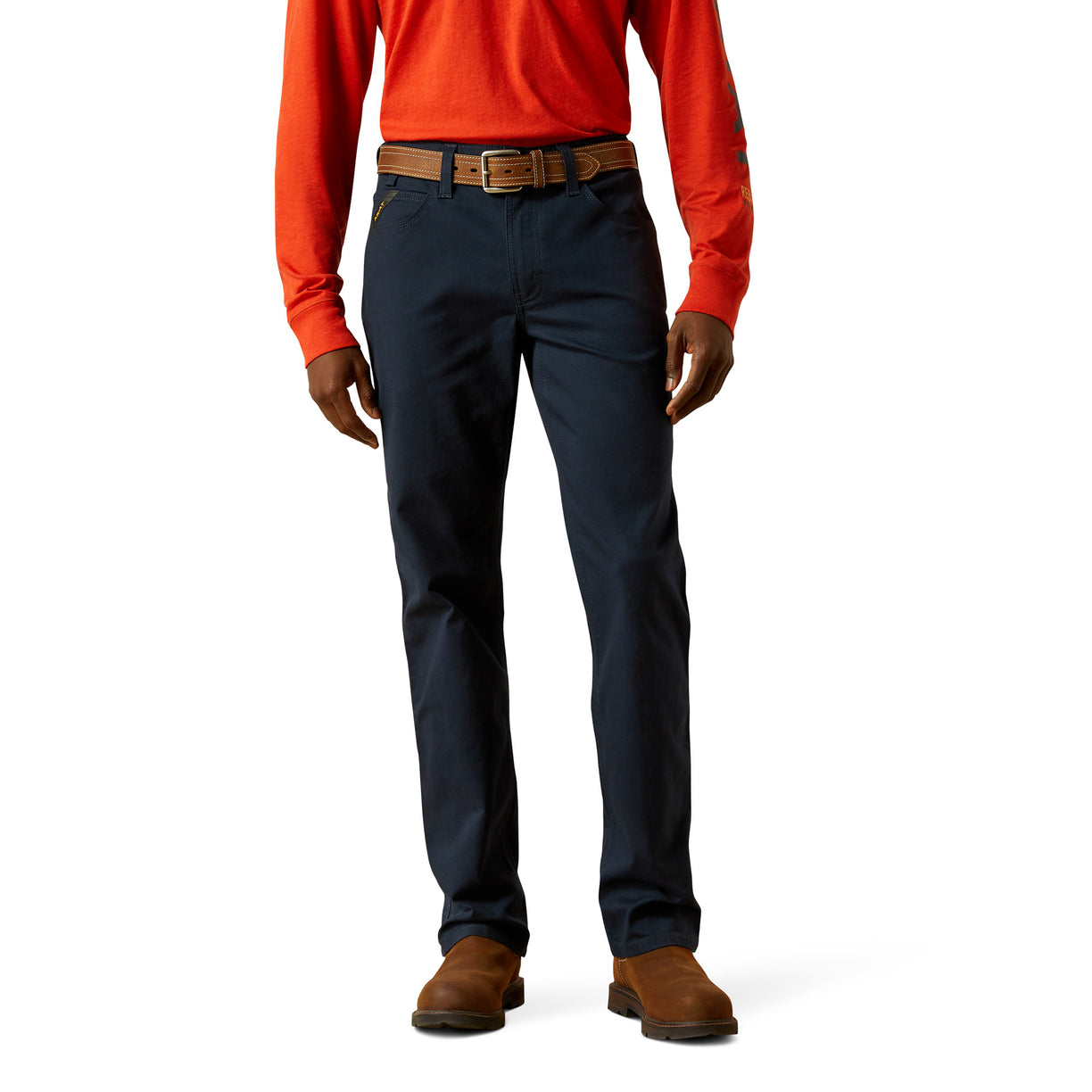 Person wearing navy pants with a red shirt on a white background