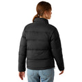 Person wearing a black puffer jacket on a white background