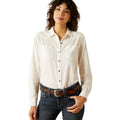 Woman wearing a white button-up shirt and jeans on a white background