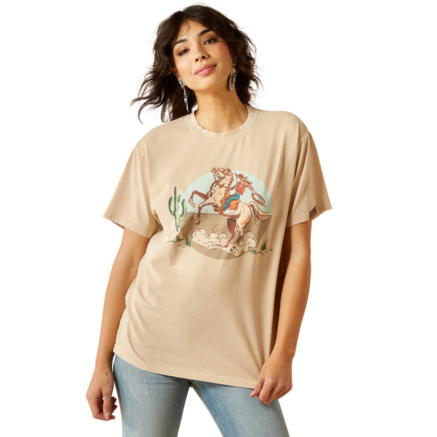 Woman wearing a beige t-shirt with a graphic design on a white background