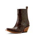 Brown crocodile-patterned leather boot on a white background