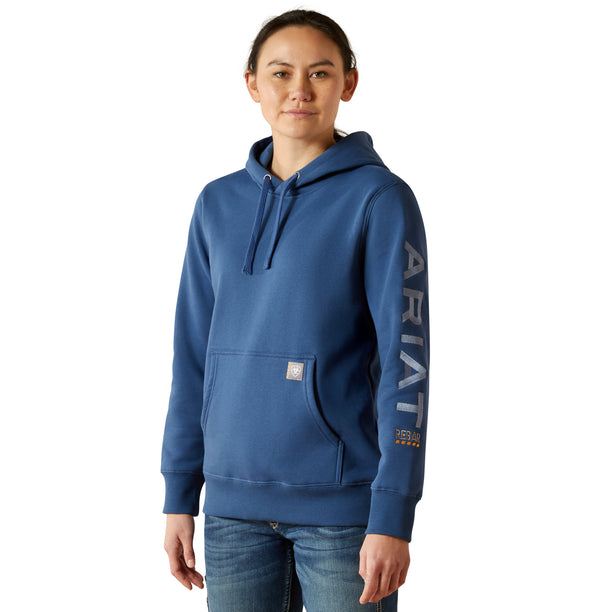 Person wearing a blue hoodie with 'Ariat' branding on a white background