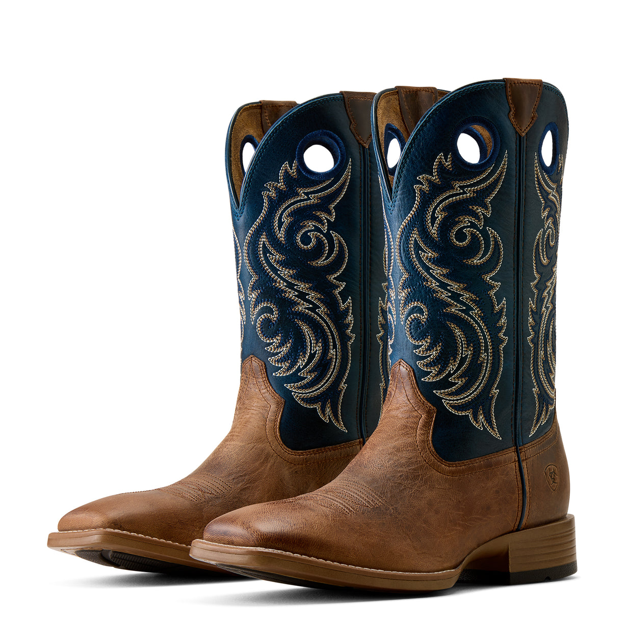 Brown cowboy boots with blue embroidered shafts on a white background