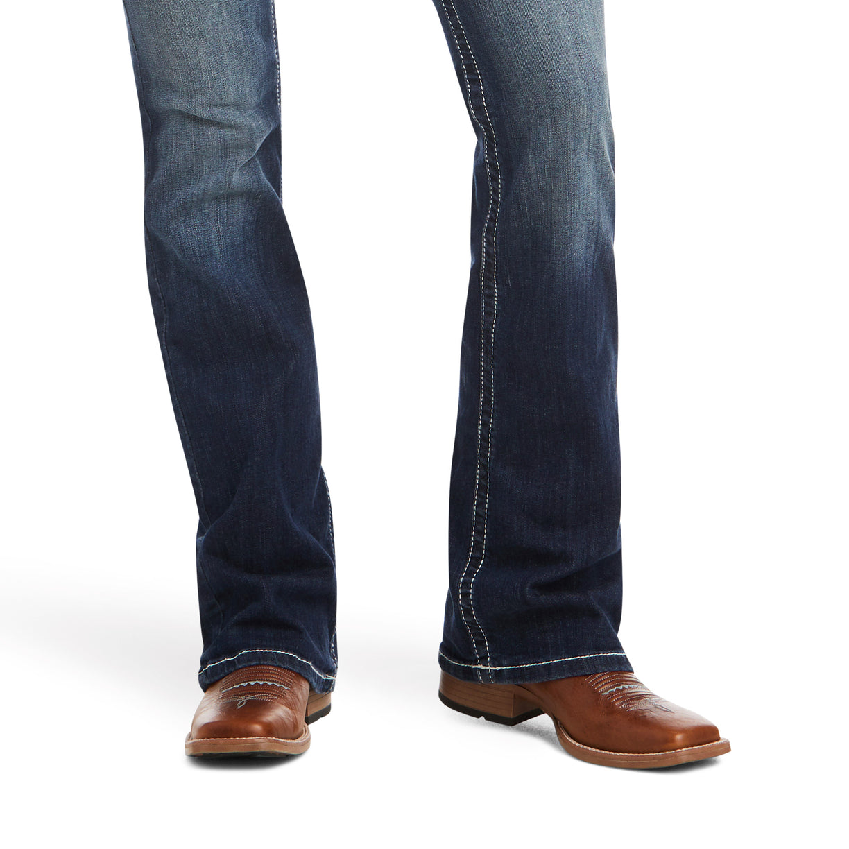 Dark blue jeans and brown shoes on a white background