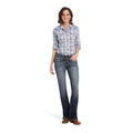 Woman wearing a plaid shirt and jeans on a white background