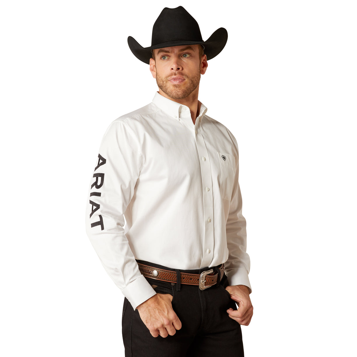 Man wearing a white Ariat shirt with a black cowboy hat on a white background