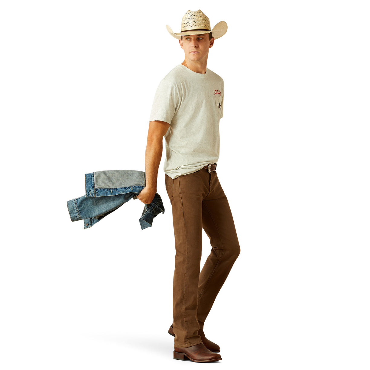 Man wearing a light gray t-shirt with Ariat logo on a white background