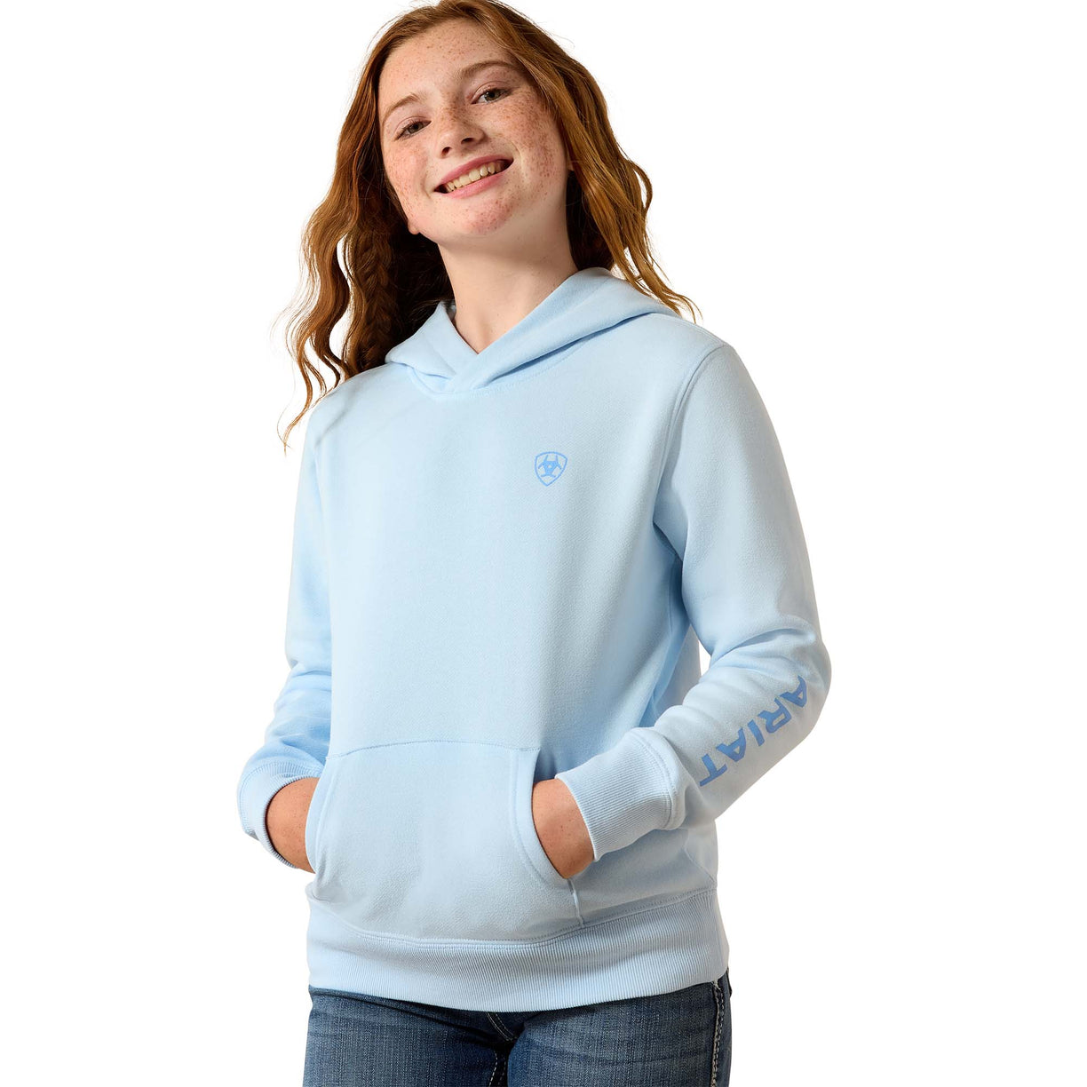 Person wearing a light blue hoodie with a logo on a white background