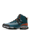 Blue hiking boot with orange accents on a light gray background