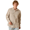 Man wearing a beige striped shirt on a white background
