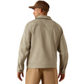 Man wearing a beige jacket and pants with a brown cap on a white background