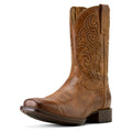 Brown cowboy boot with intricate stitching on a white background