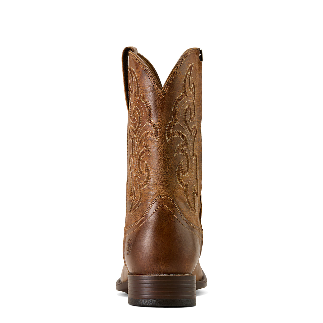 Brown cowboy boot with intricate embossing on a white background