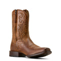 Brown cowboy boot with intricate design on a white background