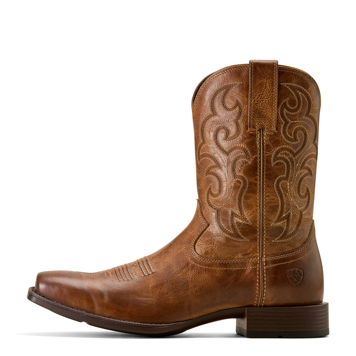 Brown cowboy boot with intricate embossing on a white background