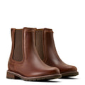 Pair of brown leather boots on a white background