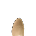 Close-up of a beige boot sole on a white background