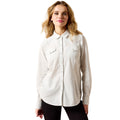 Woman wearing a white button-up shirt on a white background